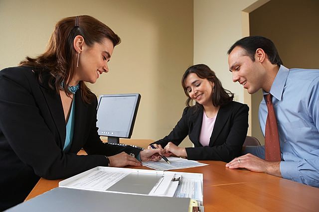 Couples in Real Estate Agent's Office.jpg