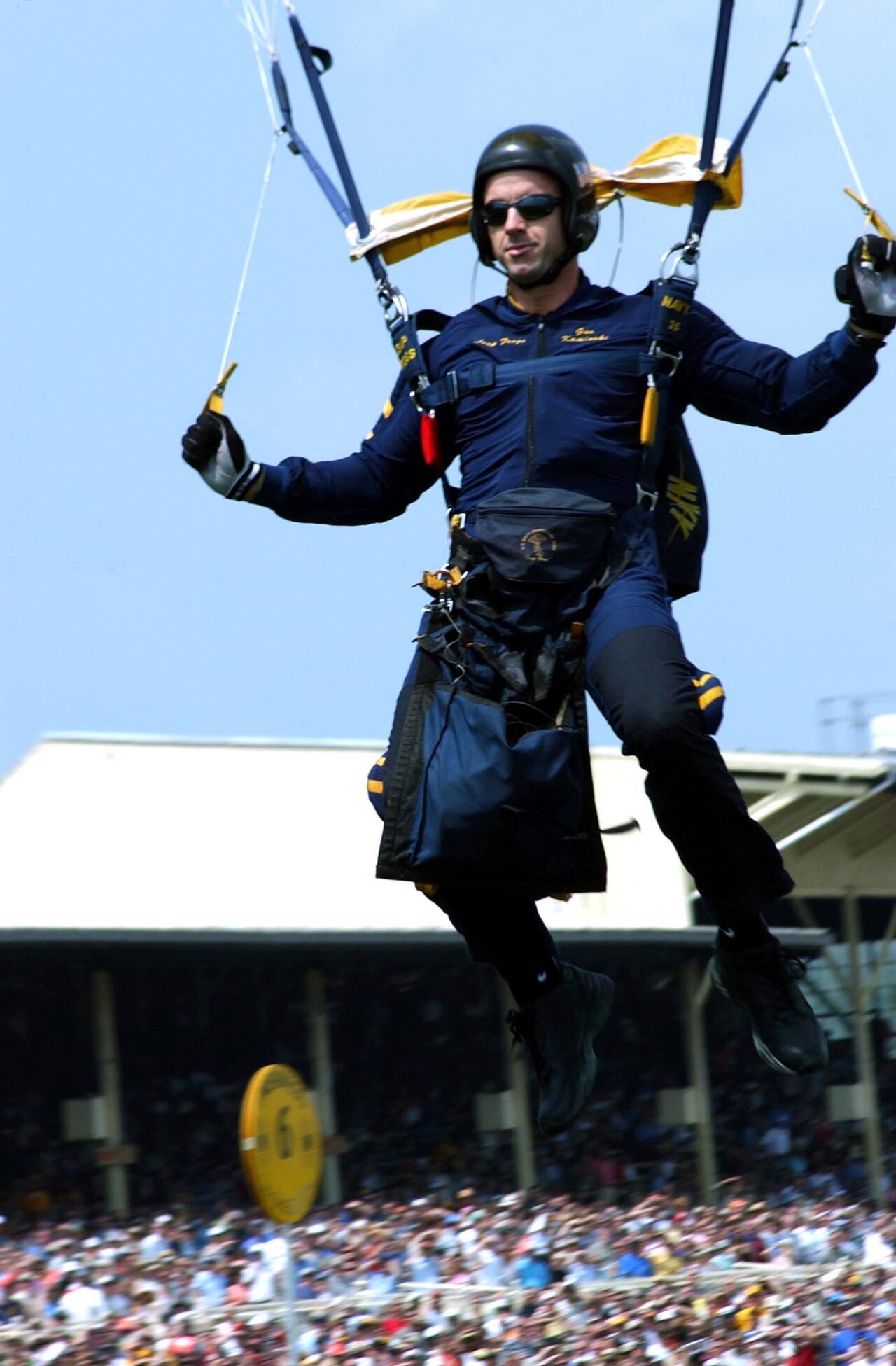 US Navy 040515-N-4729H-065 Lt. Cmdr. Gus Kaminski, officer in charge of the Navy parachute team the Leapfrogs, drops into Pimlico Race Track.jpg