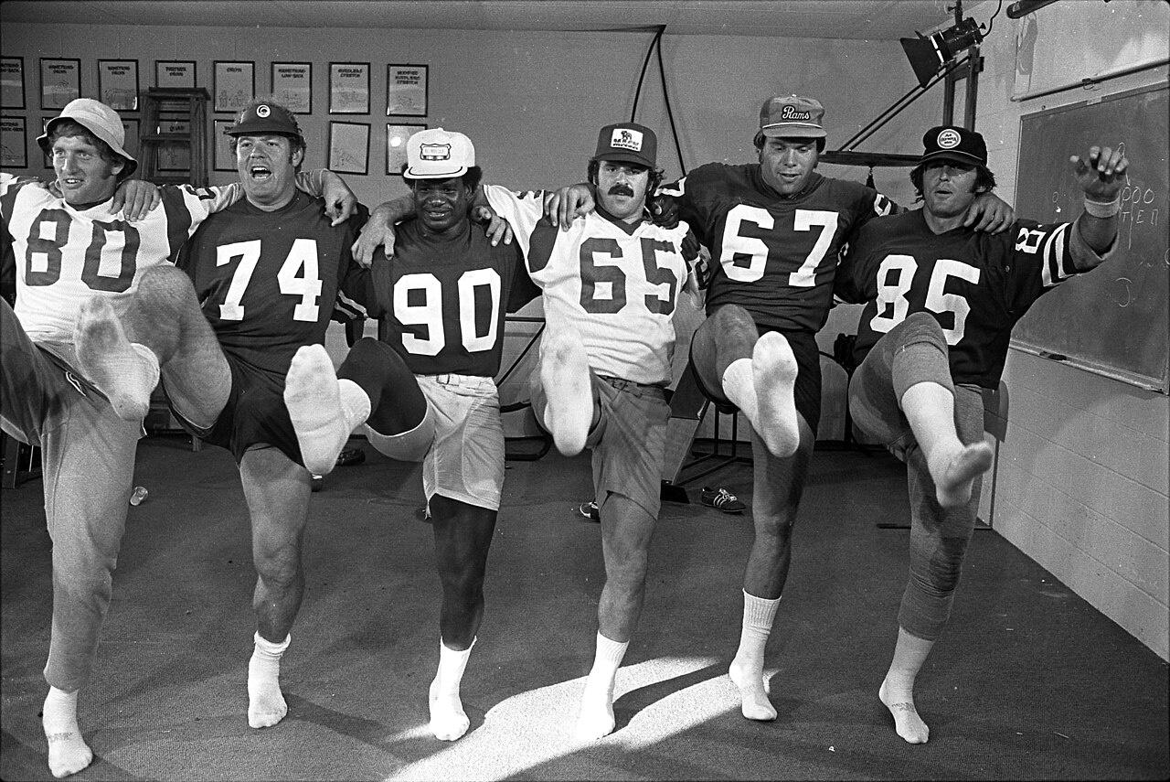 Los Angeles Rams players performing a kick line dance.jpg